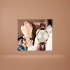 A men's watch with a golden case, white dial and brown leather strap Application Scenario